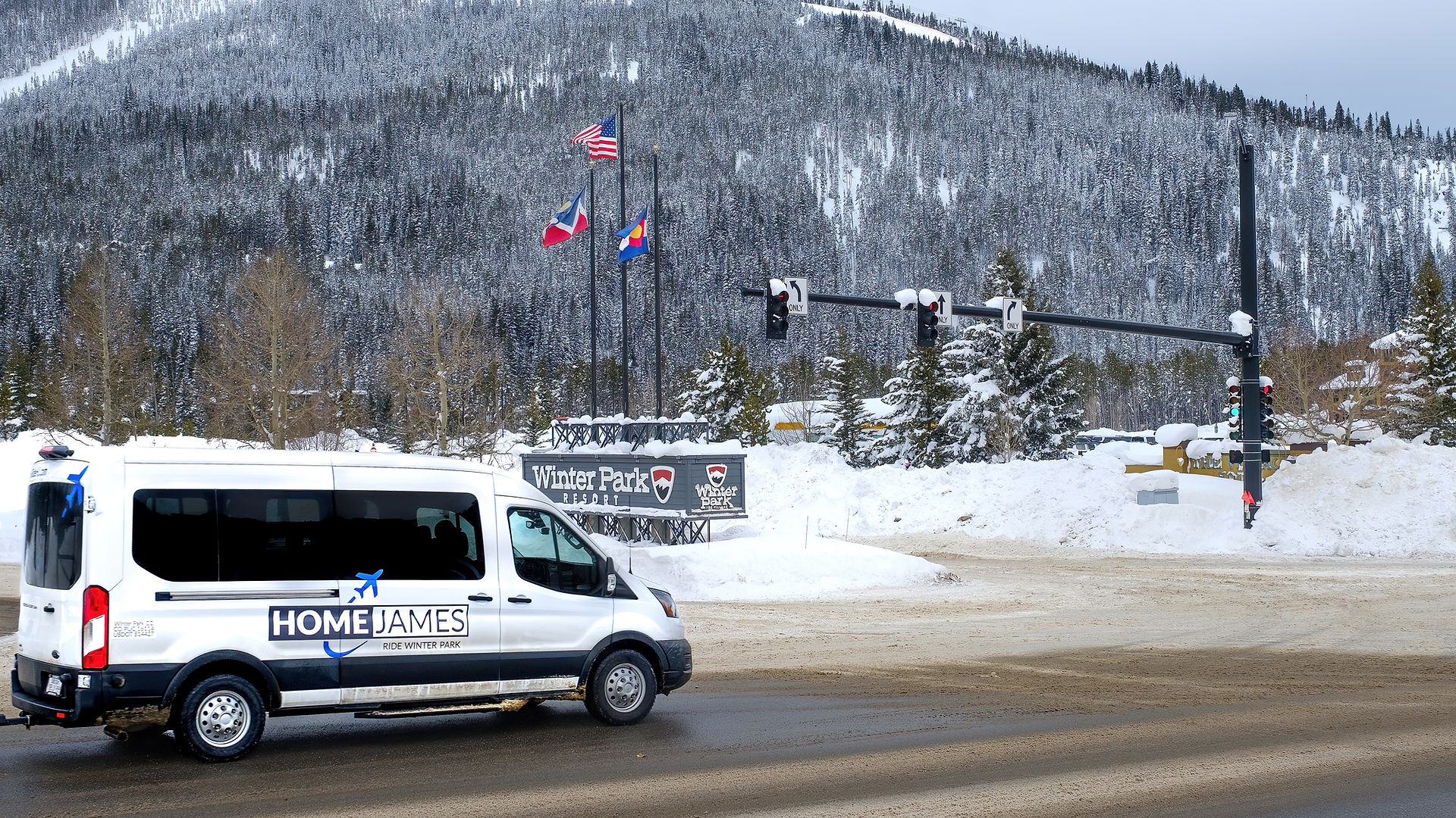 Home James van at Winter Park sign